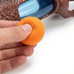 Lançador de Bolinhas Dinossauro Brinquedo Menino e Menina com 10 - brinquedo infantil Kinderland Toys